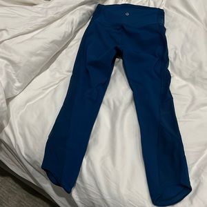 Blue ankle leggings with mesh fabric panels